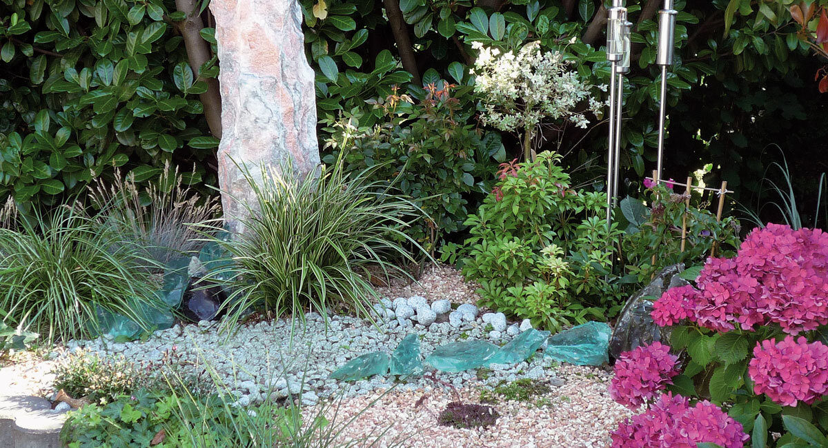 Gartengestaltung mit Zierkies und Ziersteinen von Monte Graniti